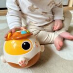Interaktywny piesek kula usypiacz i zabawka muzyczna - Woopie Baby - 002