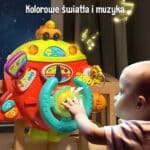WOOPIE BABY Interaktywna Kierownica Samolot Pojazd na Łózeczko Wózek Efekty 18m+ - 006