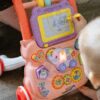 WOOPIE BABY Interaktywny Chodzik Pchacz Muzyczny + Znikopis